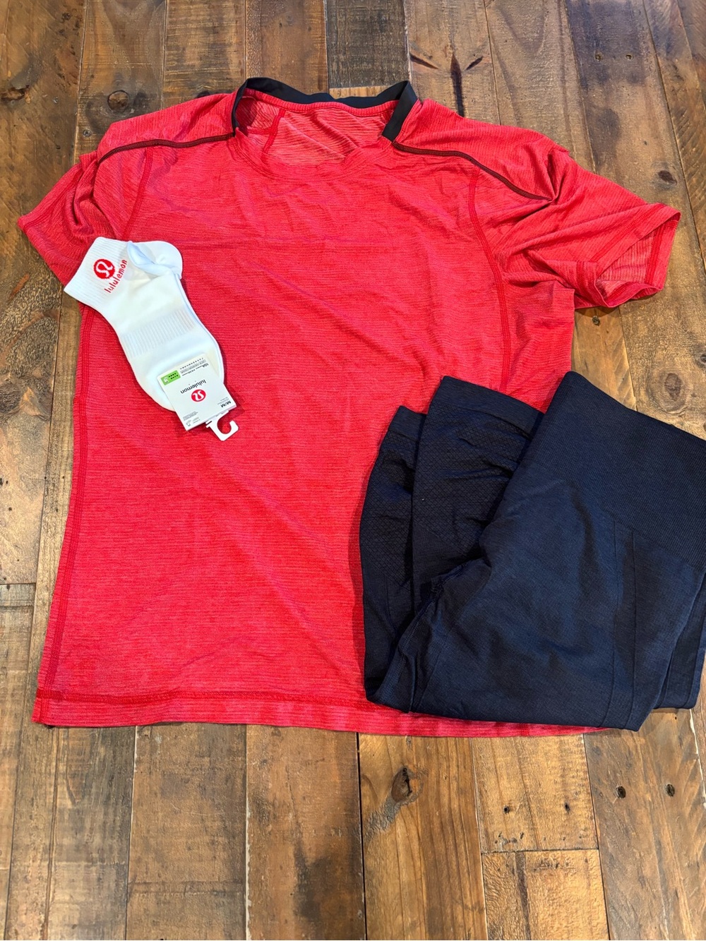 lululemon athletica Red Short-Sleeve Top with Black Leggings and White Lulu Sock